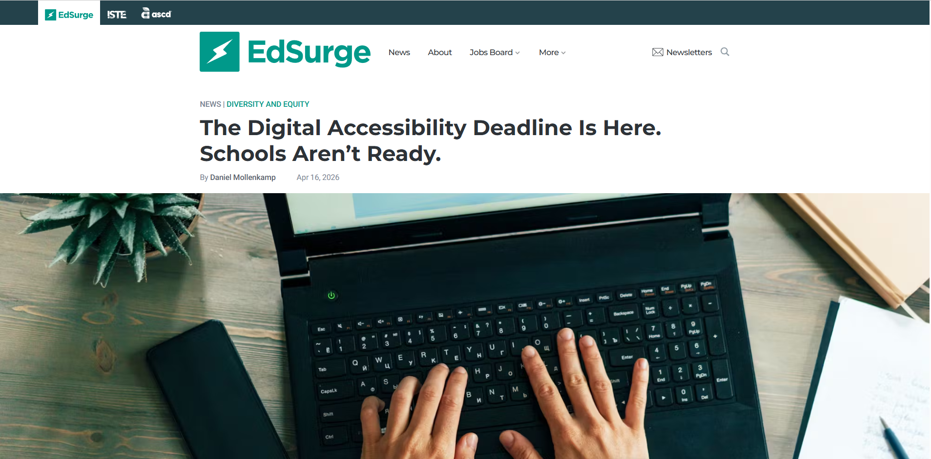 EdSurge article titled “The Digital Accessibility Deadline Is Here. Schools Aren’t Ready.” shown on a laptop screen with hands typing on the keyboard.
